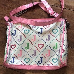 adorable hot pink early 2000’s Justice bag. So cute